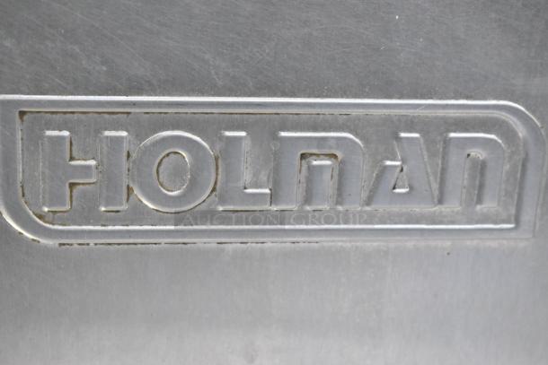 Star Holman stainless steel commercial conveyor toaster oven; 120 volts, 1 phase; Holman logo visible.