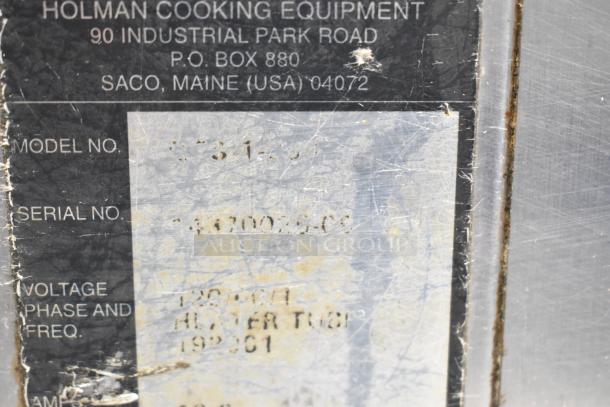 Close-up of a label on a Star Holman commercial conveyor toaster oven, showing model and serial numbers; 120 volts, 1 phase.