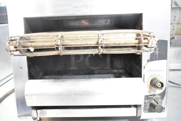 Star Holman stainless steel commercial conveyor toaster oven, 120 volts, 1 phase, visible wear, adjustable conveyor speed.