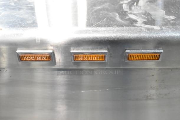 Taylor 340-27 stainless steel frozen beverage machine panel with "ADD MIX" and "MIX OUT" lights visible.