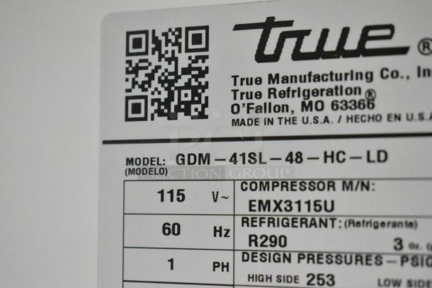 Label for True GDM-41SL-48-HC-LD cooler shows specifications, including 115 volts, phase 1, and R290 refrigerant.