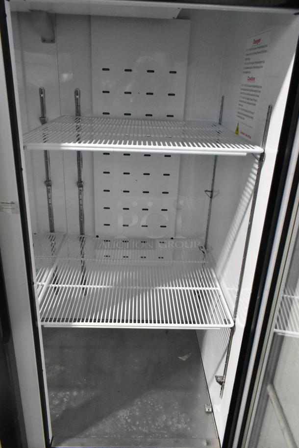2022 Blue Air BKGF49-HC metal commercial 2-door freezer with poly-coated racks, 115V, 1 phase, in good condition.