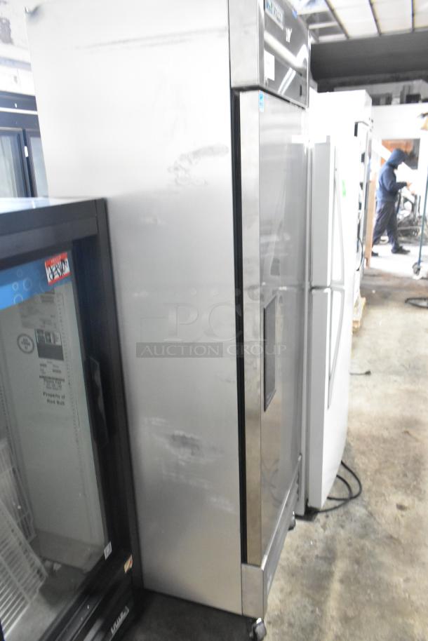 2022 True T-19F-HC stainless steel commercial reach-in freezer, side view, poly-coated racks, 115 volts, 1 phase.