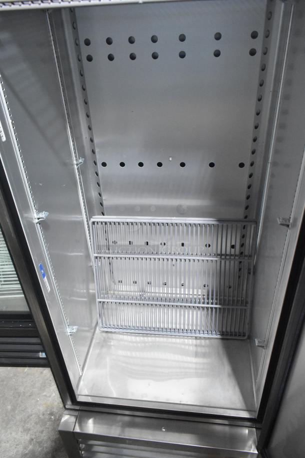 2022 True T-19F-HC stainless steel reach-in freezer, poly-coated racks, commercial-grade, 115V, single door, excellent condition.