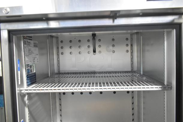2022 True T-19F-HC stainless steel freezer, single door, poly coated racks, label shows 115 volts, excellent condition.