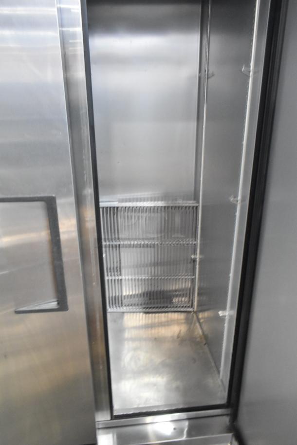 2018 True T-35-HC stainless steel commercial cooler, two doors, poly-coated racks, 115V, 1 phase, excellent condition.