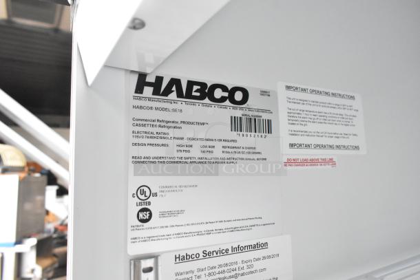 2019 Habco SE18 commercial cooler label showing model, electrical rating, and operating instructions.