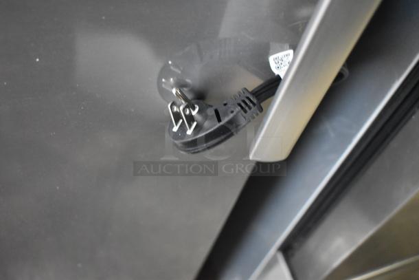 Samsung RZ11M7074SA convertible upright freezer plug; 11.4 cu. ft., silver finish, visible power cable, sleek design.