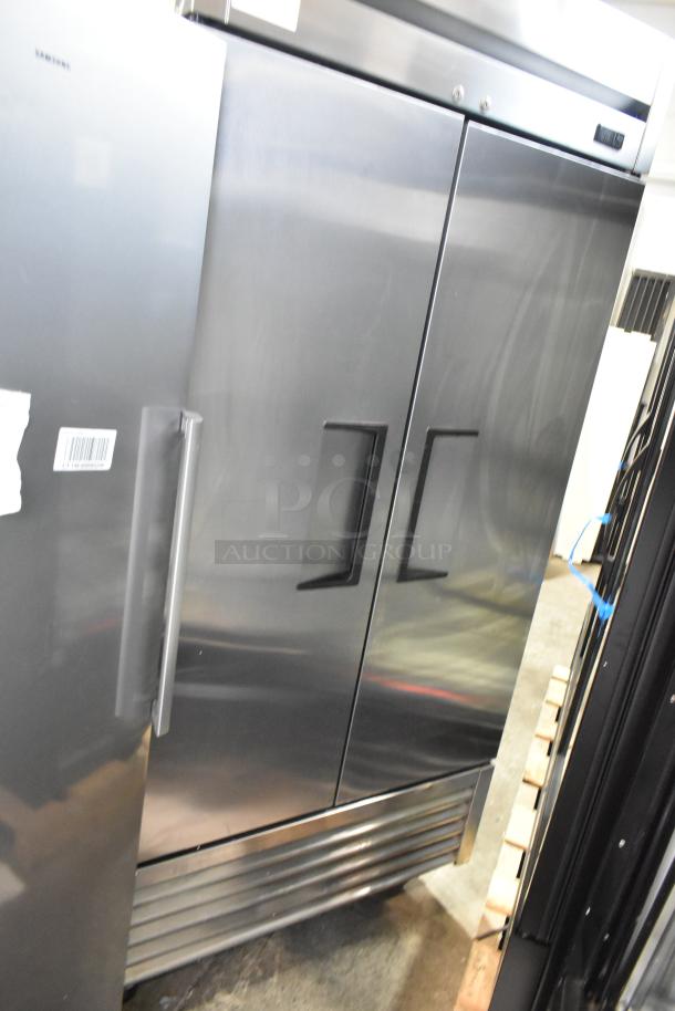 2018 True T-35-HC stainless steel commercial 2-door reach-in cooler with poly-coated racks, 115V, excellent condition.