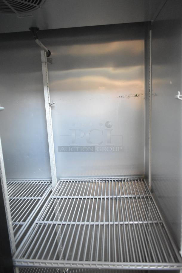 2018 True T-35-HC 2 Door Reach-In Cooler, stainless steel interior, poly-coated racks, 115V, 1 phase, commercial use.