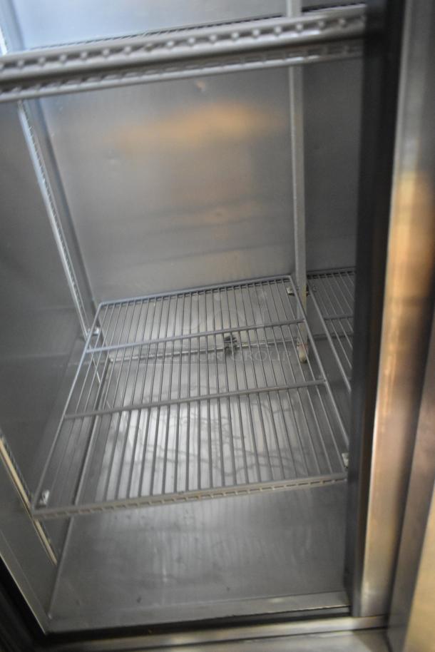 2018 True T-35-HC 2 Door Stainless Steel Cooler, poly-coated racks, excellent condition, 115V, 1 phase. Interior view.