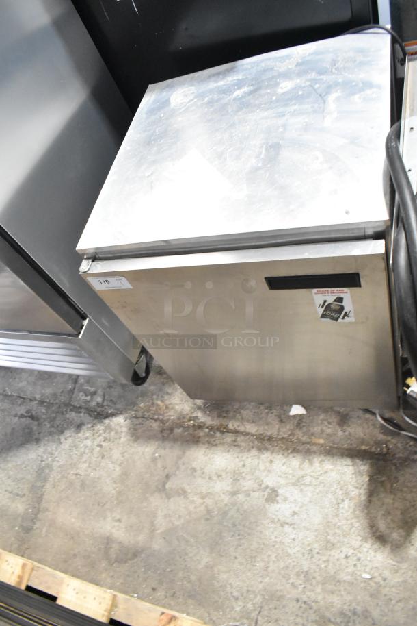 Delfield 406CA-DHL-DD1 stainless steel undercounter cooler on casters, single door, 115V, 1 phase, visible wear on the top.
