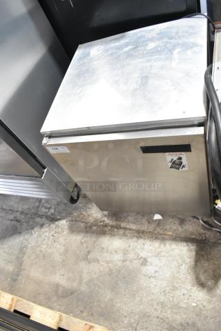Delfield 406CA-DHL-DD1 stainless steel undercounter cooler on casters, single door, 115V, 1 phase, visible wear on the top.