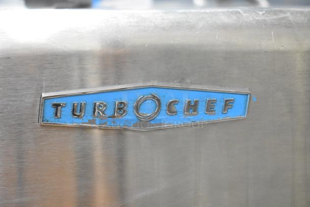 Turbochef HhC2020 stainless steel rapid cook conveyor oven label showing slight wear.