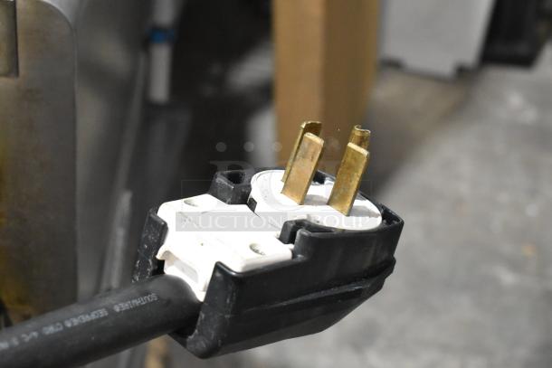 Close-up of power plug for Turbochef HhC2020 stainless steel rapid cook conveyor oven, 208/240V, 3-phase.