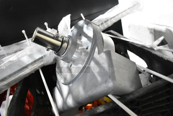 Metalic component assembly in a lot featuring a pelican head piece and rack. Items appear in good condition.