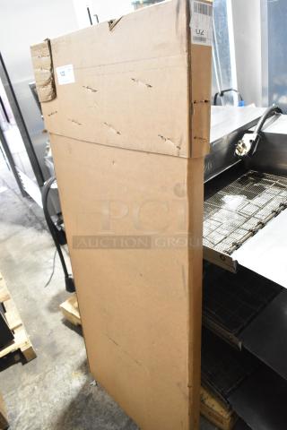 Brand new PD-8 glass door, scratch and dent condition, in original packaging with visible wear on cardboard.