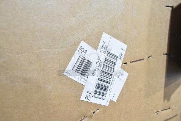 Brand new PD-8 glass door in original packaging with minor scratches and dents. Tags display model details and barcodes.