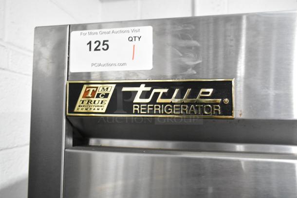 True T-35-HC stainless steel commercial reach-in cooler, 2 doors, poly-coated racks, 115V, 1 phase, model label visible.