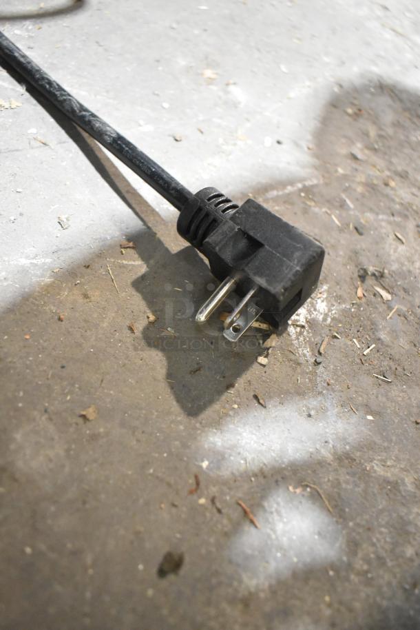 2023 Carnival King crepe maker power cord on floor; stainless steel, dual non-stick surface, model 382TCM16DBL.