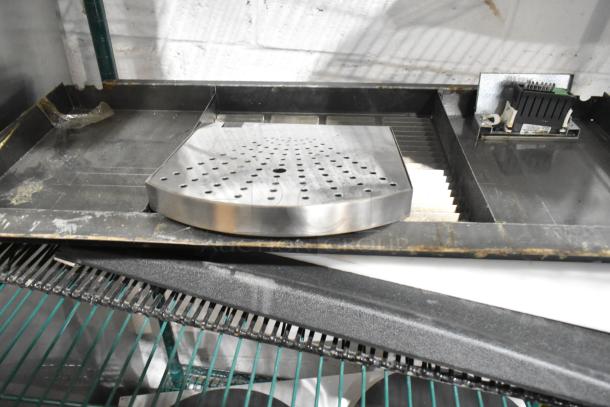 Tier lot of various items including metal pieces and a Lavex 712SNRSS stainless steel wall mount sanitary napkin receptacle.