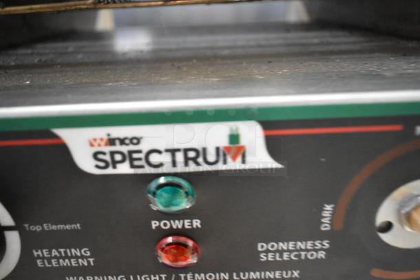 Winco Spectrum ECT-300 stainless steel countertop conveyor oven, front control panel, 120V, doneness selector visible.