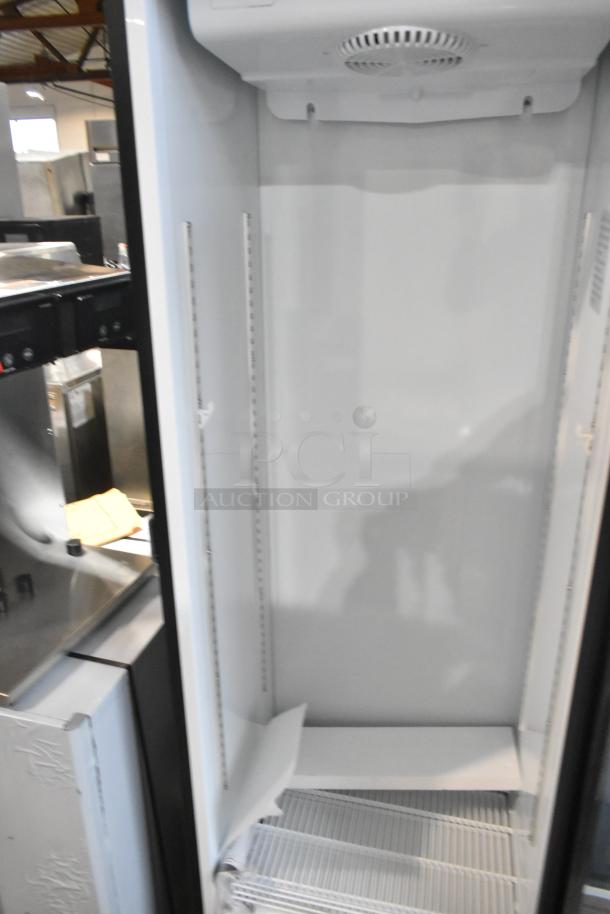Brand new KoolMore KM-MDR-1GD-10C commercial display refrigerator, scratch and dent condition, metal interior, 115 volts.