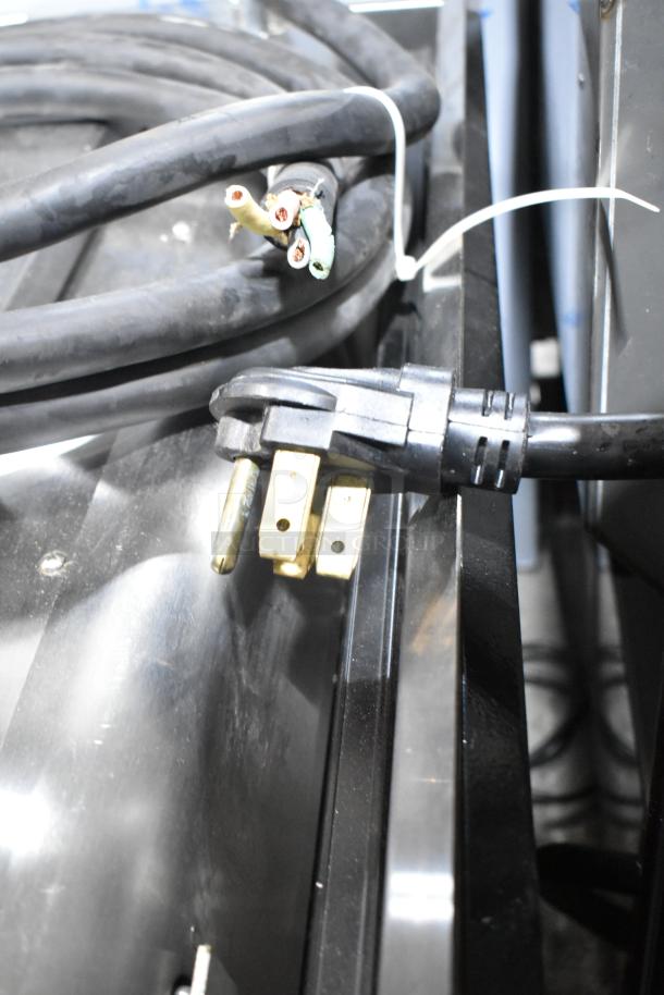 Hobart Advansys stainless steel undercounter dishwasher, electrical cord detail, used condition, visible wiring.