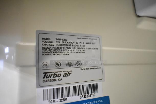 Turbo Air TGM-22RV cooler label showing model, voltage (115V), frequency (60Hz), phase (1), amps (7.6), and refrigerant info.