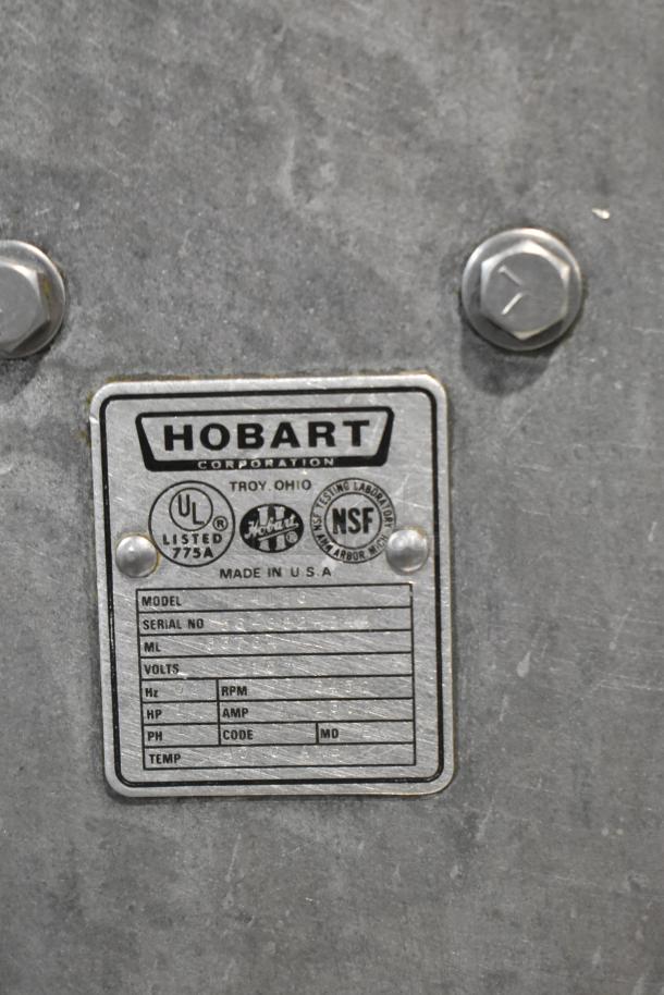 Hobart 84186 metal commercial buffalo chopper, 115V, 1-phase. Features manufacturer label with model and certification markings.