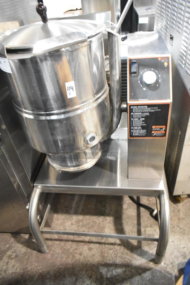 Groen stainless steel commercial floor steam kettle with control panel. Durable condition, model info on front panel.