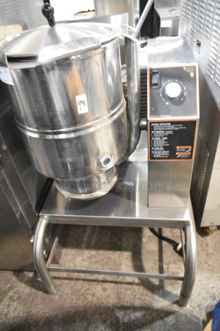 Groen stainless steel commercial floor steam kettle with control panel. Durable condition, model info on front panel.