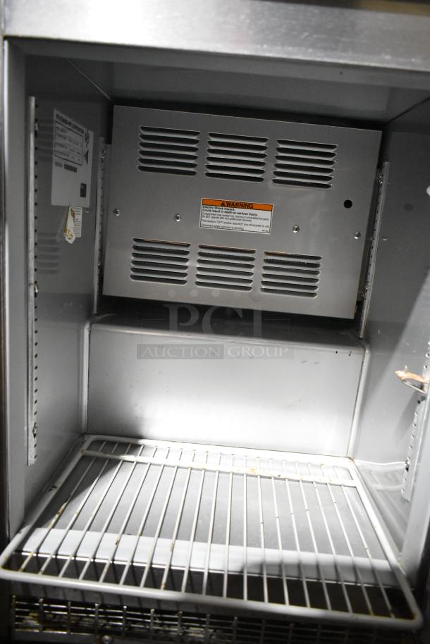 Beverage Air UCR20Y-23 stainless steel commercial undercounter cooler, single door, 115V, interior view with shelf and warning label.