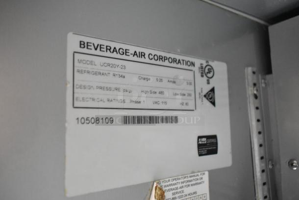 Beverage Air UCR20Y-23 label showing model, refrigerant type R134a, design pressure, and 115V electrical ratings.