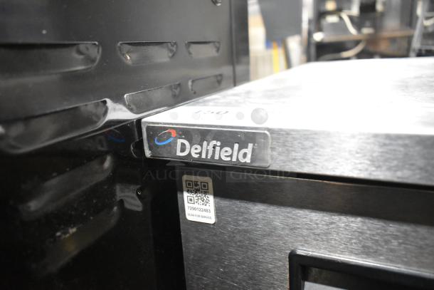 Delfield 406P-STAR2 stainless steel single door undercounter cooler, 115V, 1 phase, QR code for service, logo visible.