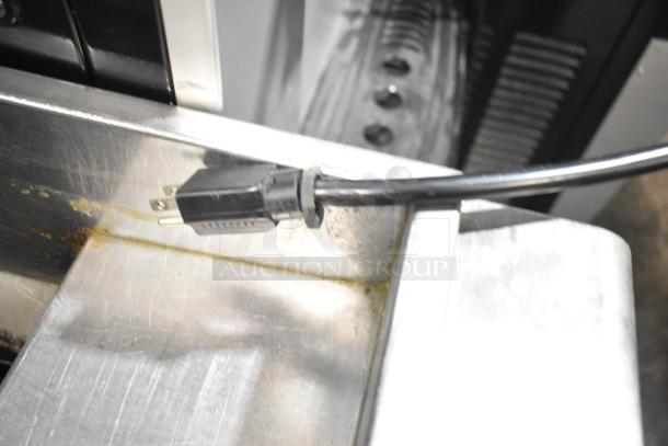 Vevor YKF-9228 stainless steel soft serve machine power cord, 110V, with commercial casters, showing plug detail.