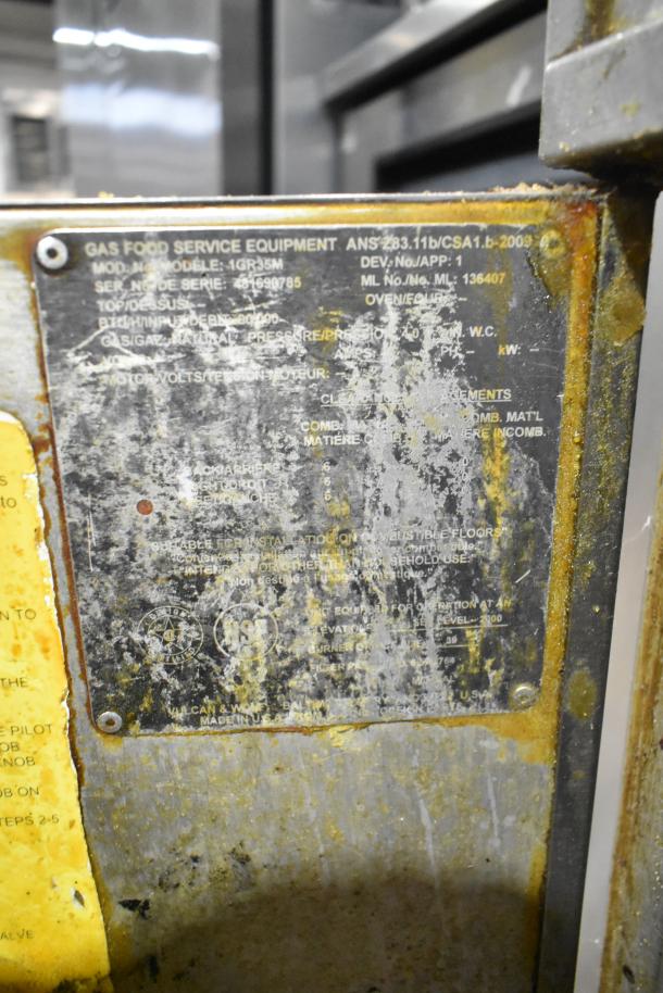 Vulcan 1GR35M Stainless Steel Commercial Deep Fat Fryer, natural gas, 80,000 BTU, visible wear, includes model and serial plate.