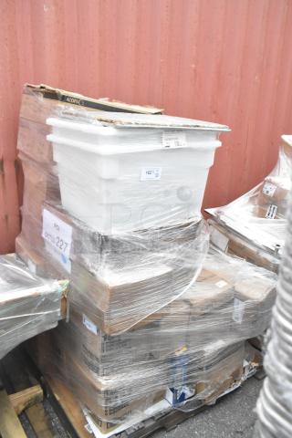 Wrapped pallet containing 20 new scratch and dent items, including glasses, a cutting board, coil, and plates. Box labeled "Acopa."