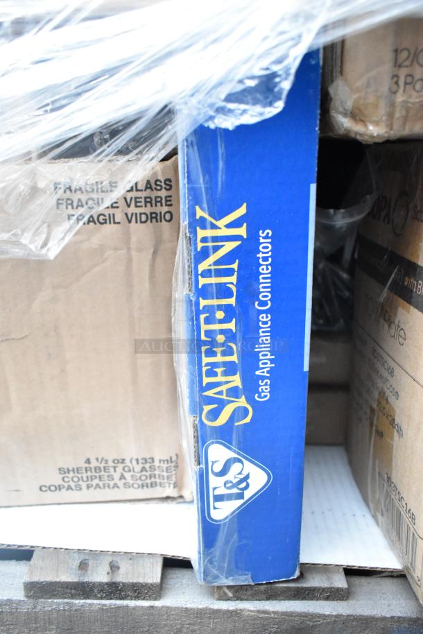 Box of T&S Safelink gas appliance connectors on pallet. Nearby is a box labeled "Sherbet Glasses" 4 1/2 oz (133 mL). Items sold as scratch and dent.