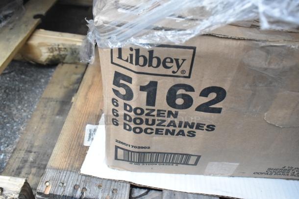 Libbey box containing 6 dozen items, labeled model 5162. Visible under plastic wrap on wooden pallet.