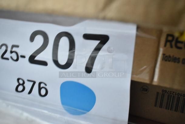Alt text: Auction lot labeled 25-207, showing part of cardboard packaging with numbers and a barcode.