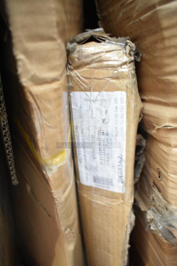 Brown cardboard boxes containing 8 brand new scratch and dent auction items, labels visible indicating item codes and details.