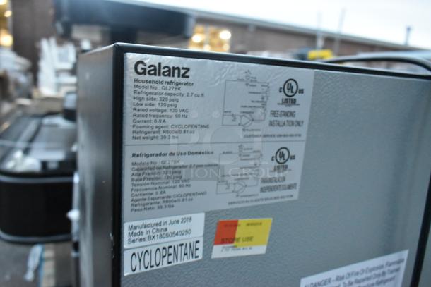 Galanz GL27BK mini cooler label, 2.7 cu. ft. capacity, 120 VAC, 60 Hz, 39.3 lbs. Includes model and manufacturing details.
