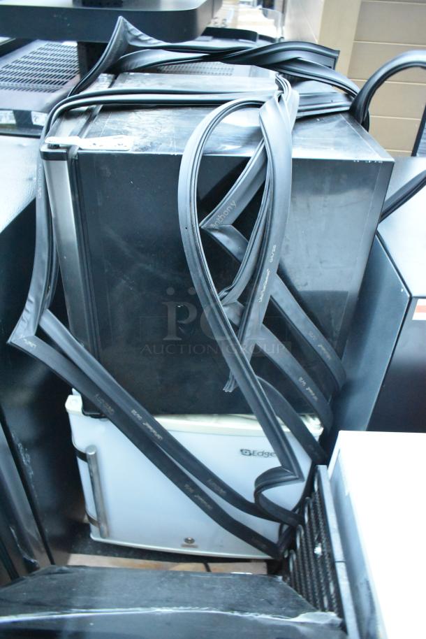 Six mini coolers, including Galanz GL27BK and Frigidaire FGFR334, 115 volts, 1 phase, bundled for auction.