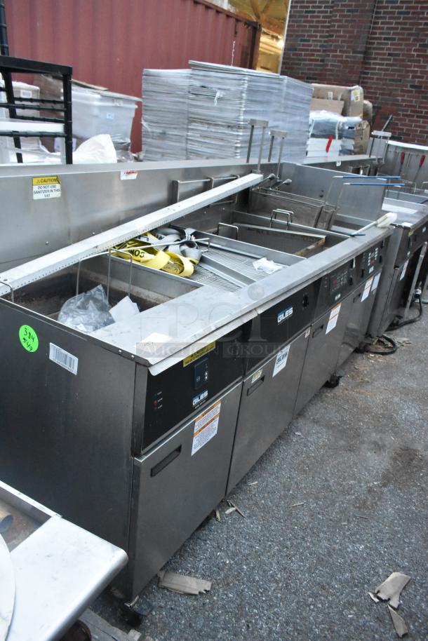 Giles EOF-24 stainless steel 3-bay commercial electric fryer with dumping station on casters, 480V, 3-phase, in used condition.