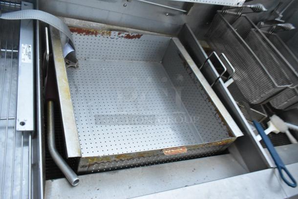 Giles EOF-24 stainless steel 3 bay deep fat fryer, electric, with dumping station, on commercial casters; 480 volts, 3 phase.