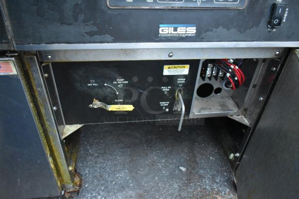 Giles EOF-24 stainless steel electric 3-bay deep fat fryer with dumping station and commercial casters, 480V, 3-phase.