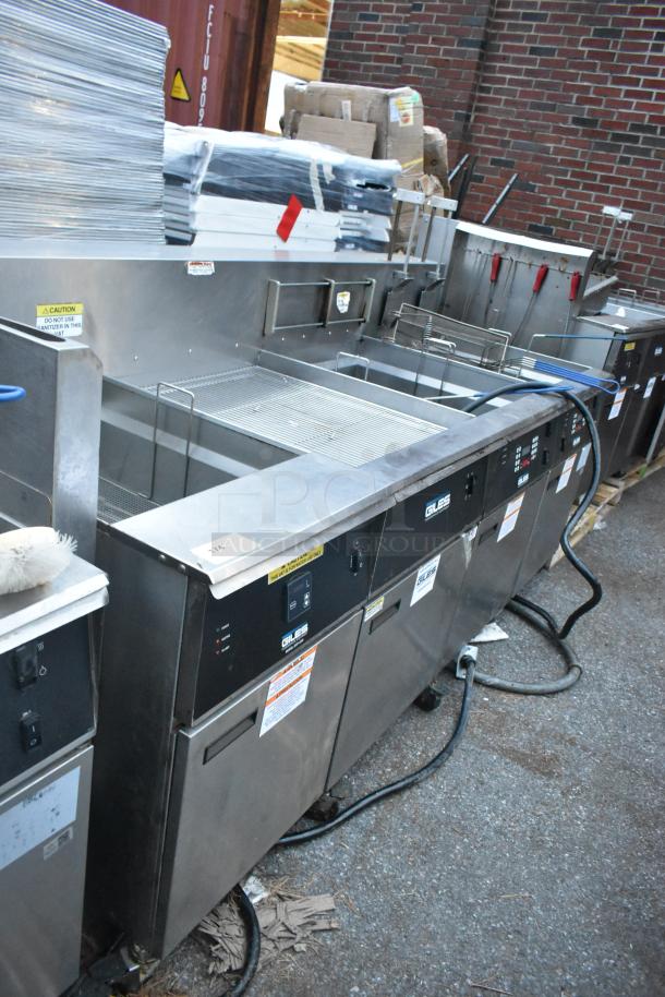 Giles EOF-24 stainless steel 3-bay deep fat fryer with dumping station, 480V, 3-phase, on commercial casters, good condition.