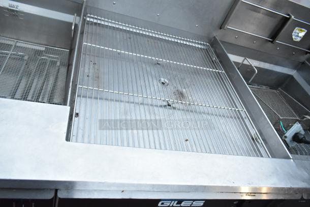 Giles EOF-24 stainless steel 3 bay electric deep fat fryer with dumping station, commercial casters. 480V, 3 phase.