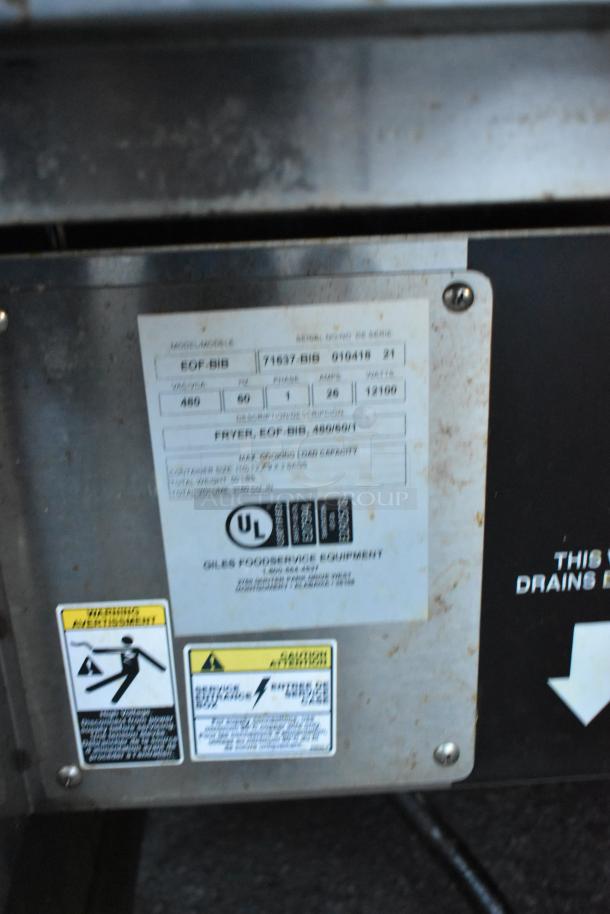 Giles EOF-24 stainless steel commercial electric 3 bay deep fat fryer with dumping station, labels showing model and specs.